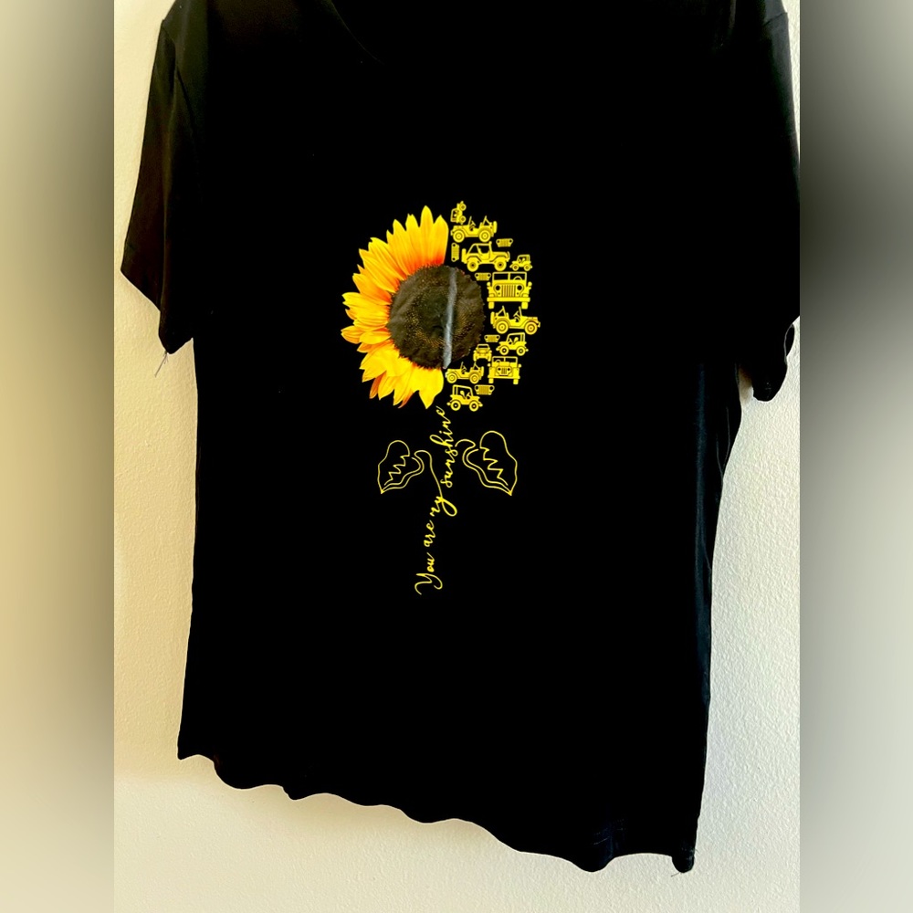 Black T-shirt run like large size, never used.